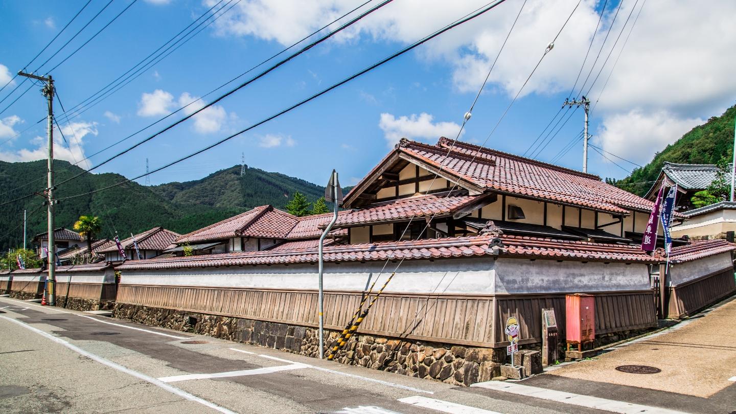 Koh company dormitory buildings 7, 8, 9, 19, the earthen wall, and the karami stone wall
